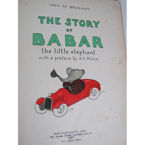 176 - Four 1930s Babar the Elephant books, a Phillips Planisphure guide to the stars and a selection of bo... 