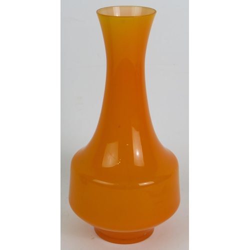 180 - A blue Whitefriars Knobbly glass vase and an orange mid century glass vase. Tallest 25cm. (2). Condi... 