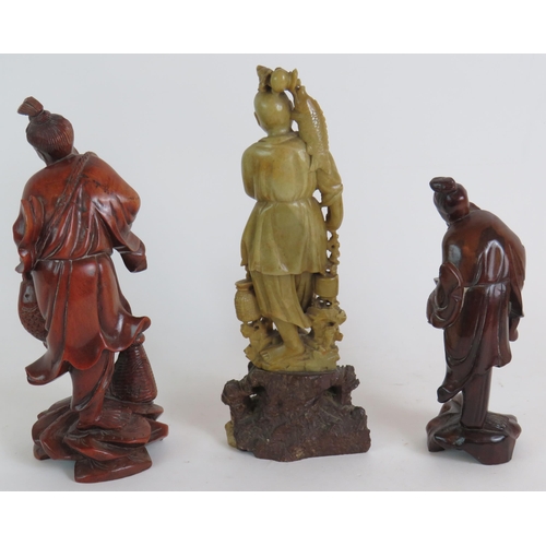 187 - Two Chinese hardwood root carvings of fisherman plus a similar Hardstone carving 25cm tall. (3). Con... 