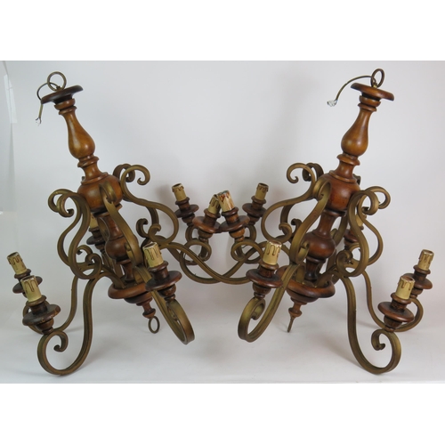 189 - Two gilt metal and wood six branch electric chandeliers, height 70cm. (2). Condition report: Vintage... 