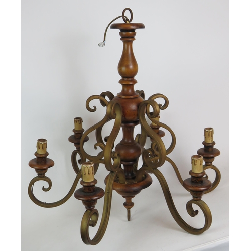 189 - Two gilt metal and wood six branch electric chandeliers, height 70cm. (2). Condition report: Vintage... 