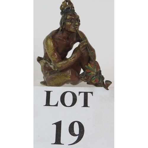 19 - A Franz Bergman cold painted bronze figure of a crouching native American Indian smoking a pipe, sta... 