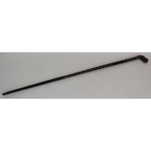 191 - An Asian bone inlaid ebony walking cane with leather covered handle and barley twist shaft. Length 8... 