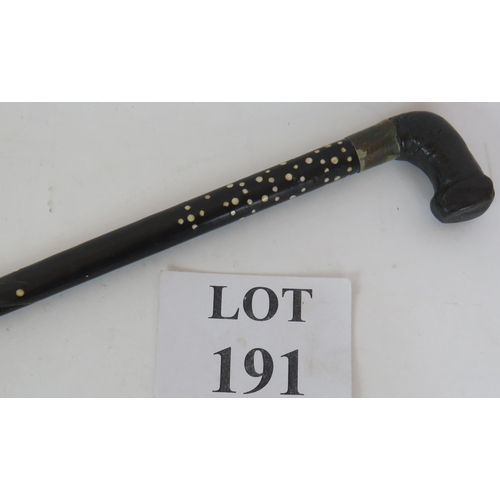 191 - An Asian bone inlaid ebony walking cane with leather covered handle and barley twist shaft. Length 8... 