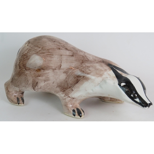 202 - A large Rye Pottery badger by David Sharp, 35cm long. 
Condition report: Firing crack to front leg.
... 