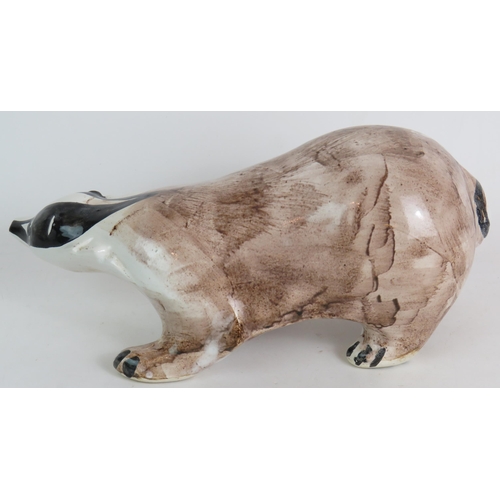 202 - A large Rye Pottery badger by David Sharp, 35cm long. 
Condition report: Firing crack to front leg.
... 