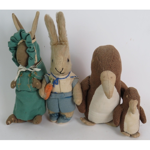 203 - Seven vintage handmade soft toys including Eeyore, Peter Rabbit and Babar the Elephant, Circa 1930s.... 