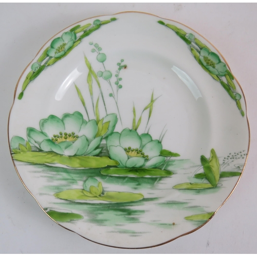 209 - A seven piece Royal Paragon Water Lily tea set hand decorated in green. (7).
Condition report: No is... 