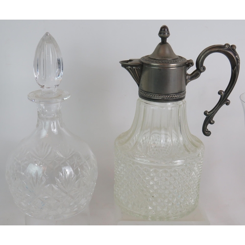 210 - A good quality cut crystal decanter, a white metal mounted claret jug, four blue wine glasses and ei... 