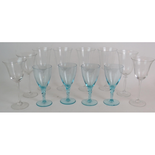 210 - A good quality cut crystal decanter, a white metal mounted claret jug, four blue wine glasses and ei... 