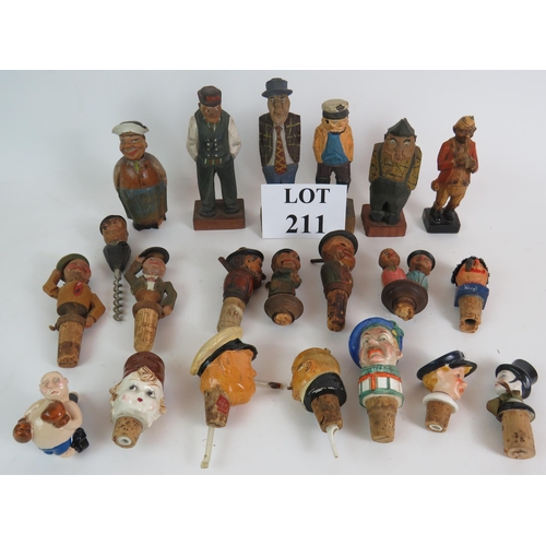 211 - A collection of mainly Black Forest style carved wood figures and bottle stoppers including automate... 