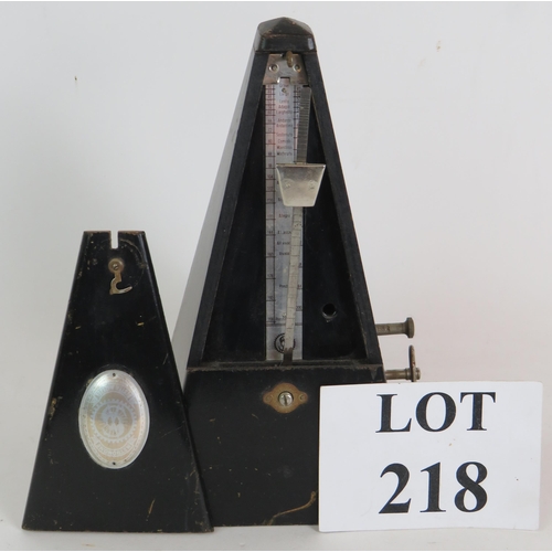 218 - A black Japanned Maelzel metronome with bell, dated 1965. Height 22cm.
Condition report: Feet missin... 