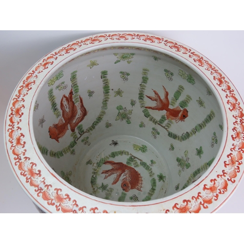 22 - A very large Chinese porcelain fish bowl, internally decorated with goldfish and externally with flo... 