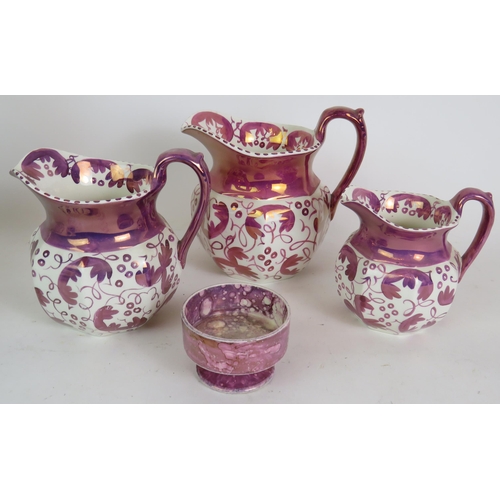 229 - Three graduated Wedgwood purple lustre jugs, a similar footed dish, two Allerton's Gaudy mugs, a lar... 