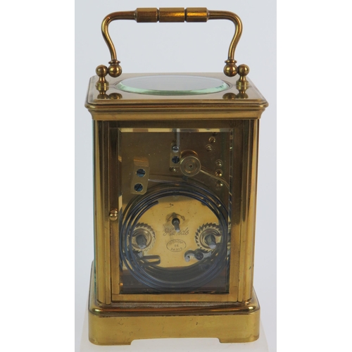 23 - A good quality brass cased French striking carriage clock with key, stamped R & Co Paris No 124, ove... 