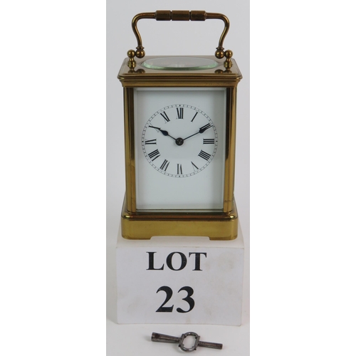 23 - A good quality brass cased French striking carriage clock with key, stamped R & Co Paris No 124, ove... 