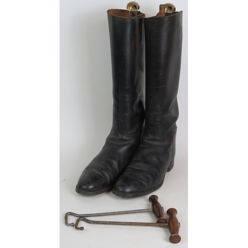 231 - A pair of vintage leather riding boots and pullers, a 19th Century beaded top footstool and a chrome... 