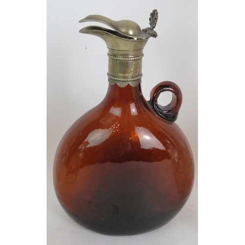 235 - Six antique decanters including a brown glass jug with white metal mount and two hobnail cut square ... 