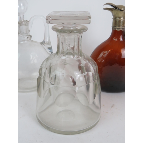 235 - Six antique decanters including a brown glass jug with white metal mount and two hobnail cut square ... 