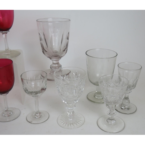 238 - A set of six 19th Century Cranberry glass wine glasses, two 19th Century rummers, three engraved swe... 