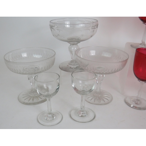 238 - A set of six 19th Century Cranberry glass wine glasses, two 19th Century rummers, three engraved swe... 