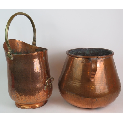 242 - A large heavy beaten copper cauldron or log bucket, 32cm x 34cm, and a similar copper and brass coal... 