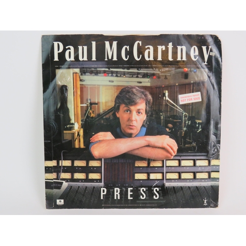 25 - A personally autographed copy of Paul McCartney's Press extended 12'' ep with sample sticker, Parlop... 