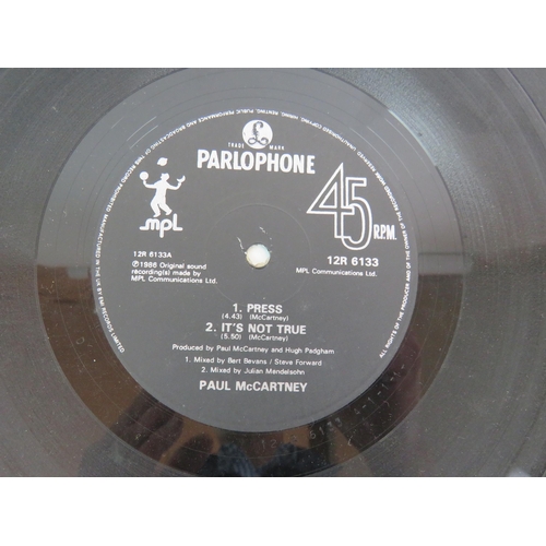 25 - A personally autographed copy of Paul McCartney's Press extended 12'' ep with sample sticker, Parlop... 