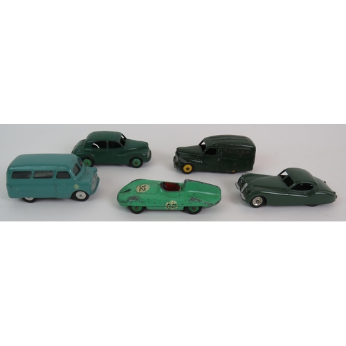 30 - Five unboxed Dinky toys including a Connaught model 236, Jaguar model 157, Morris Oxford, Austin van... 