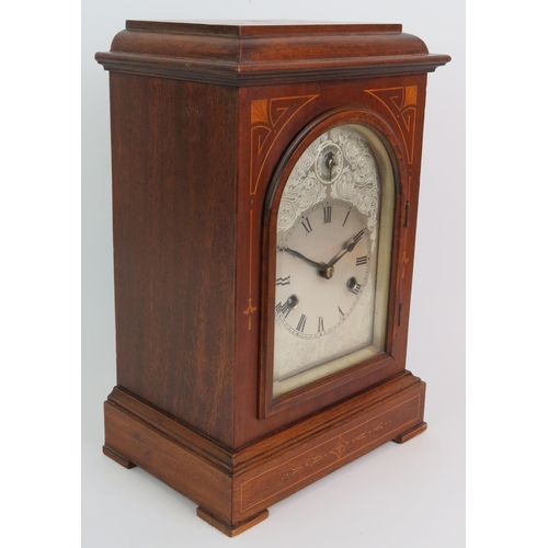 32 - An early 20th Century inlaid walnut mantel chiming clock of German manufacture, movement stamped 155... 