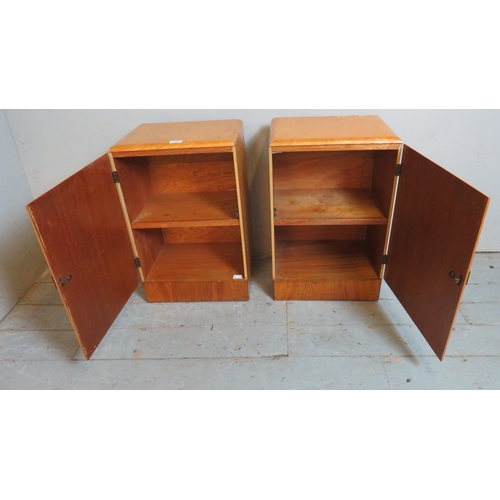 708 - A pair of Art Deco birds eye maple bedside cabinets with chamfered square wooden handles, with fitte... 