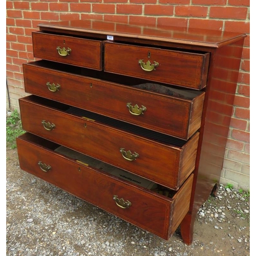 715 - A Georgian mahogany straight front chest of two short over three long graduated cock beaded drawers,... 