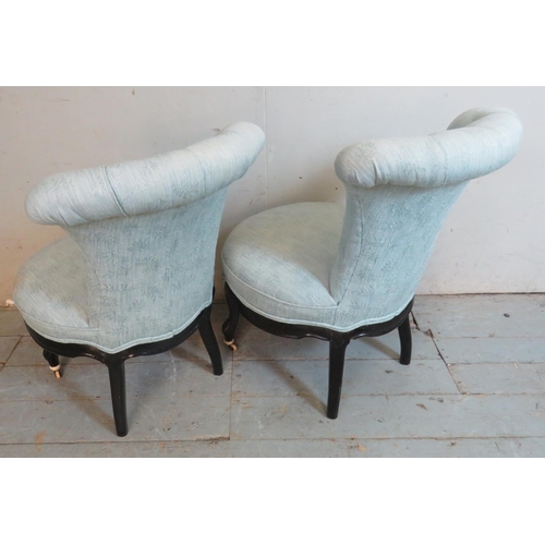 717 - A pair of Victorian button back circular nursing chairs upholstered in a duck egg blue pattered fabr... 