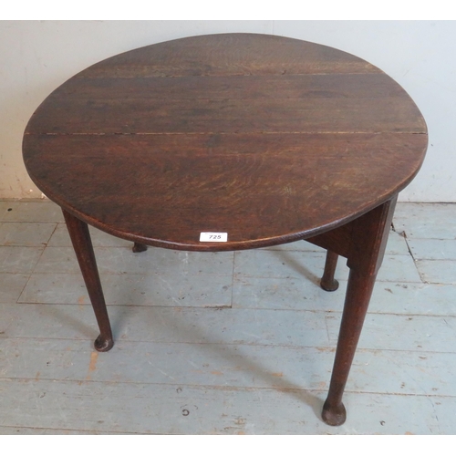 725 - An 18th century oak oval drop leaf table, raised on tapering supports with pad feet.
Estimated: £40-... 