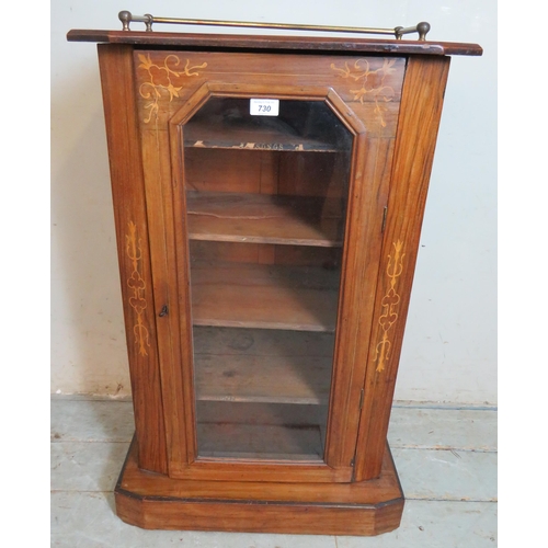 730 - A Victorian walnut marquetry inlaid side cabinet, with brass gallery rails and glazed door opening o... 