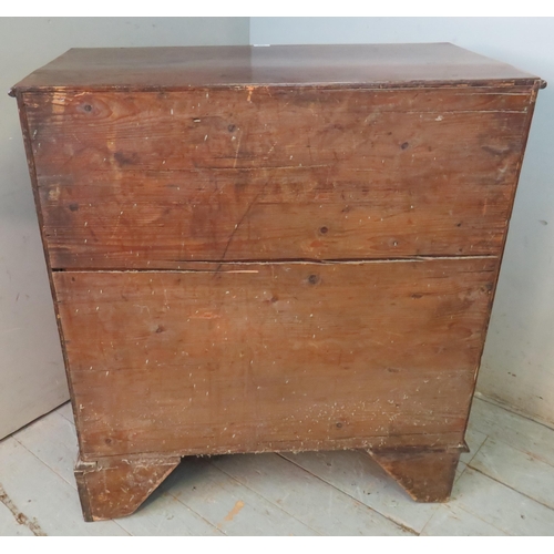 734 - A Georgian mahogany chest of two short over three long graduated cock beaded drawers with brass swan... 