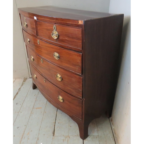 735 - A Georgian mahogany boxwood strung bow fronted chest of two short over three long graduated cock bea... 