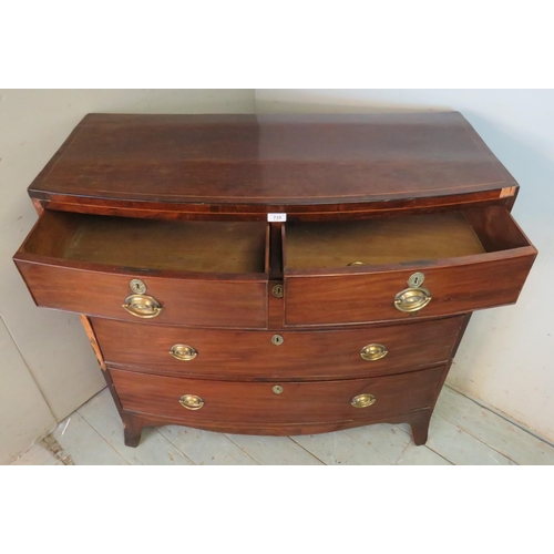 735 - A Georgian mahogany boxwood strung bow fronted chest of two short over three long graduated cock bea... 