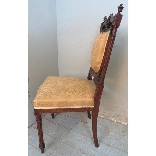 741 - A vintage French oak occasional chair, the pierced cornice carved with swags & bows, with turned woo... 