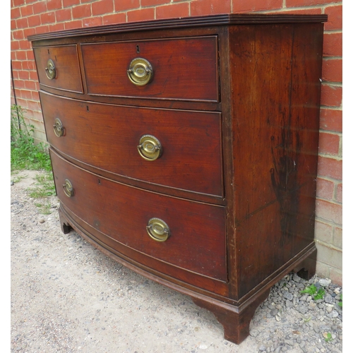 743 - A Georgian mahogany bow fronted chest of two short over two long cock beaded drawers fitted with pre... 