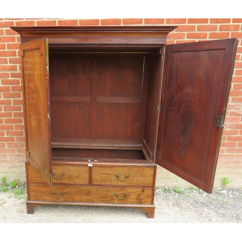 744 - A 19th century mahogany double wardrobe with field panels to doors and four dummy drawers to base, f... 