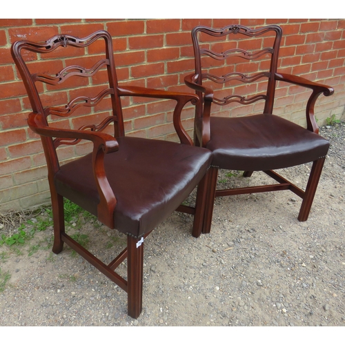 748 - A pair of good quality reproduction mahogany open sided armchairs by Chelsea House, with carved & pi... 