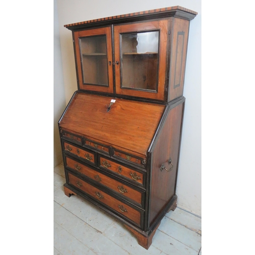 751 - An 18th century Georgian mahogany ebonised bureau bookcase with dentil cornice over glazed doors wit... 