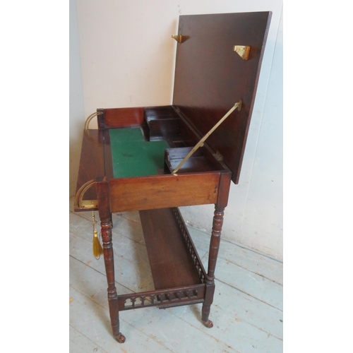 753 - An Edwardian mahogany writing desk with lockable raising lid opening to reveal letter racks & writin... 