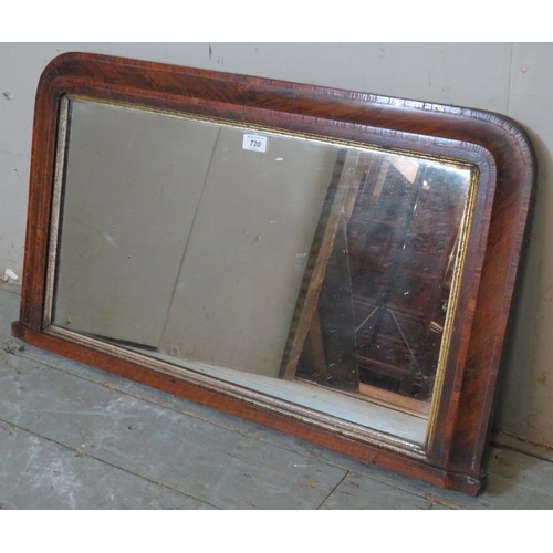 755 - A 19th century walnut framed giltwood edged over mantle mirror, crossbanded and strung with satinwoo... 