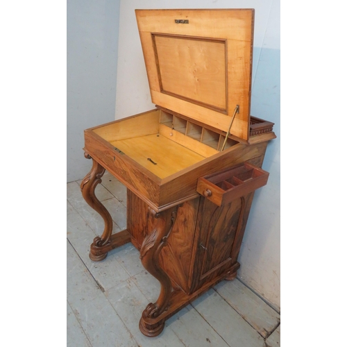 764 - A late Victorian rosewood Davenport with dentil moulded gallery and inset brown leather gilt tooled ... 