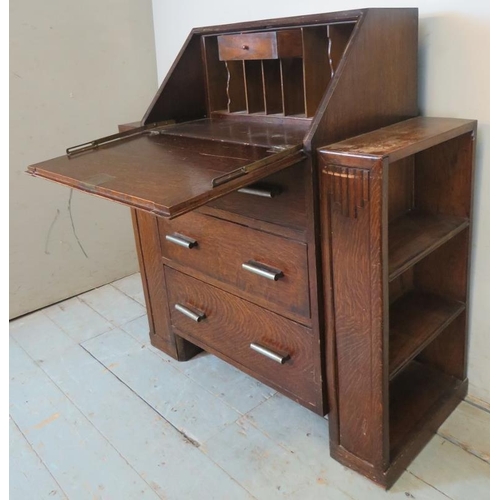 766 - An Art Deco bureau with fall front enclosing fitted interior, over three graduated long drawers with... 