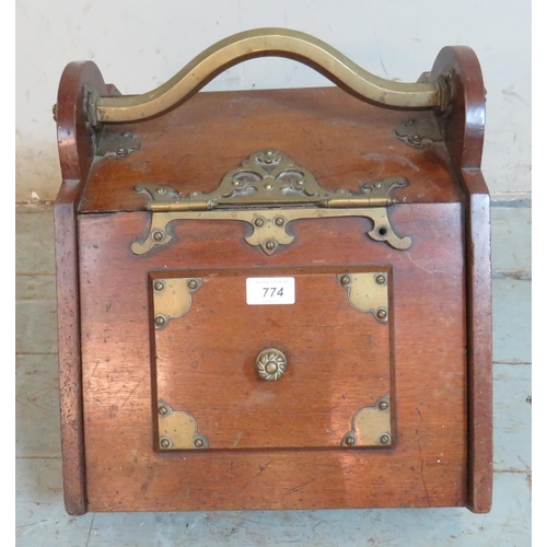 774 - A Victorian mahogany brass mounted coal scuttle.
36cm high x 35cm wide x 46cm deep (approx)
Estimate... 