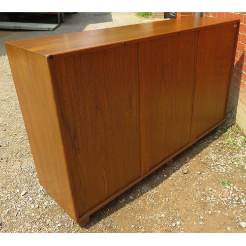 786 - An Ercol Windsor solid elm 'Golden Dawn' sideboard with three single drawers over three cupboards, a... 