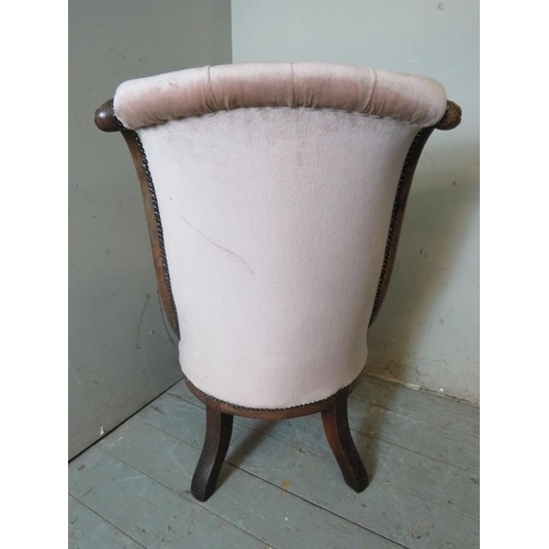 791 - A Victorian rosewood framed button back slipper chair with a scrolled back upholstered in a  light p... 